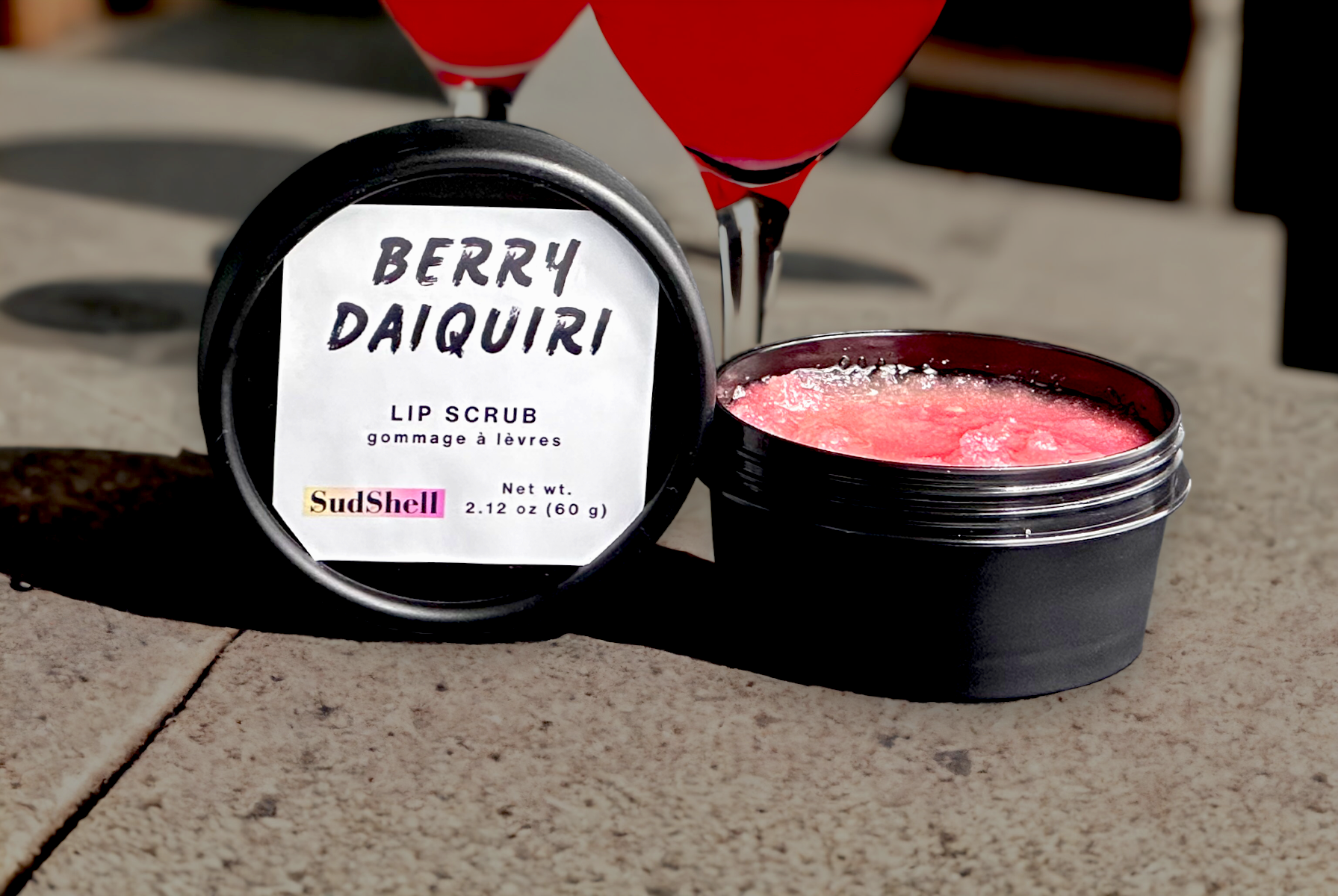 Berry Daiquiri Lip Scrub in a black cosmetic jar